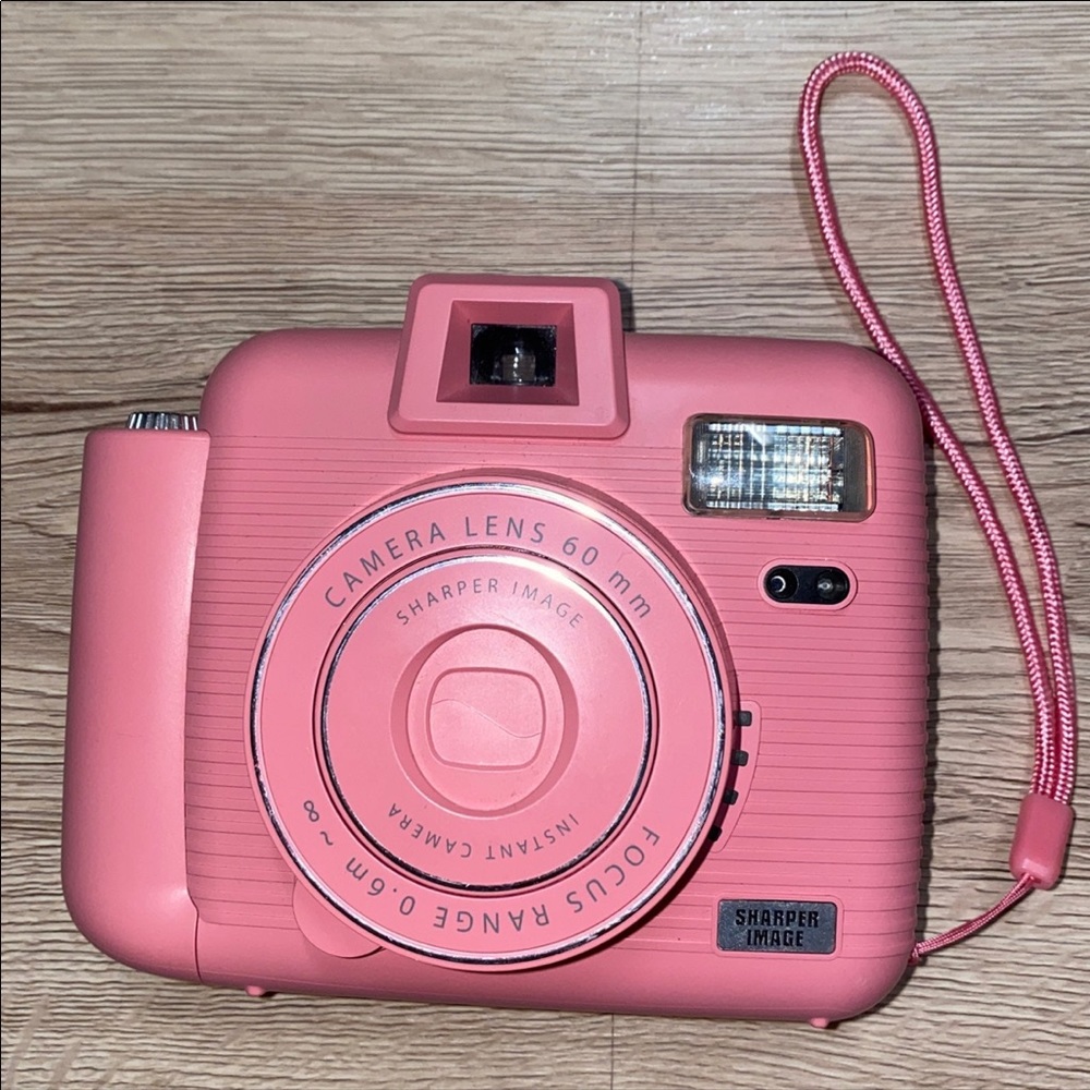 Polaroid style Sharper Image instant camera